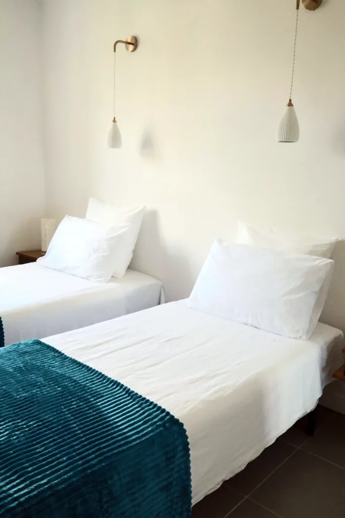 Twin single beds in The Matisse gite