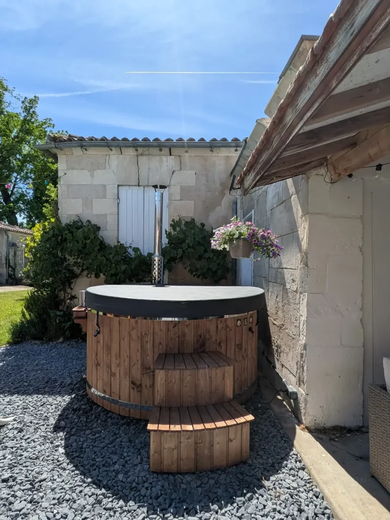 A wooden hot tub in the garden